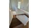 Staircase featuring wood steps, white risers and painted white walls at 1915 Cassia Aly, Kennesaw, GA 30144