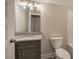 Bathroom featuring gray vanity with a granite top at 201 Daisy Coourt, Cartersville, GA 30121