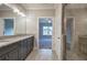 Bathroom with tiled floors and granite vanity leads to bedroom at 201 Daisy Coourt, Cartersville, GA 30121