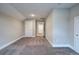 Neutral walls with carpeted floors in an upstairs bedroom at 201 Daisy Coourt, Cartersville, GA 30121