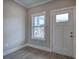 Bright entryway featuring wood-look flooring and a window with natural light at 201 Daisy Coourt, Cartersville, GA 30121