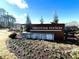 Freestone Station community sign with wooden planks and greenery at 2160 Suncrest Point, Marietta, GA 30064