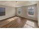 Bright and airy bedroom with neutral walls and flooring and a tray ceiling at 4405 Thorngate Ln, Acworth, GA 30101