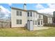 View of the home's backyard, patio, and siding at 1168 Christiana Xing, Lawrenceville, GA 30043