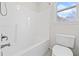 Bathroom featuring tub shower combo, tile and modern fixtures at 1168 Christiana Xing, Lawrenceville, GA 30043