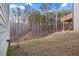 A view of the backyard with a natural tree buffer and a view of the rear deck at 3185 Tackett Rd, Douglasville, GA 30135