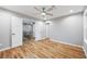 This bedroom features hardwood floors, a ceiling fan and two points of entry at 3185 Tackett Rd, Douglasville, GA 30135