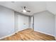 This bedroom features hardwood floors, recessed lighting, and a double door closet at 3185 Tackett Rd, Douglasville, GA 30135