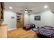 Cozy bedroom with hardwood floors, built-in shelving, a ceiling fan, and space themed decor at 415 Prestwick Ct, Alpharetta, GA 30005