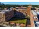 Aerial view of Ponce City Market, showcasing its unique brick architecture and rooftop greenery at 567 Ponce De Leon Ne Ave # 503, Atlanta, GA 30308