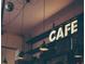 Vintage-style cafe setting with glowing signs and a cozy atmosphere at 567 Ponce De Leon Ne Ave # 503, Atlanta, GA 30308