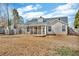 Large backyard with a screened porch, offering lots of outdoor enjoyment at 1020 Adie Cv, Mcdonough, GA 30253