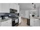 Well-lit kitchen features stainless steel appliances, granite counters, and subway tile backsplash at 1020 Adie Cv, Mcdonough, GA 30253