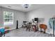 Bright office space with hardwood floors, natural light, and perfect setup for a working environment at 1020 Adie Cv, Mcdonough, GA 30253