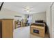 Bedroom features a ceiling fan, carpet, and closet at 1312 Preserve Park Dr, Loganville, GA 30052