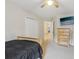 Bedroom features a ceiling fan, carpet, and closet at 1312 Preserve Park Dr, Loganville, GA 30052