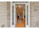 View of the foyer featuring hardwood floors, staircase, and an open layout at 1312 Preserve Park Dr, Loganville, GA 30052