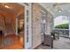 View from front door looking onto the porch with chairs and access to the home's interior at 1312 Preserve Park Dr, Loganville, GA 30052