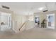 Upstairs landing featuring neutral walls and carpet at 1312 Preserve Park Dr, Loganville, GA 30052