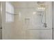 Updated shower with clear glass door and a rainfall showerhead at 1312 Preserve Park Dr, Loganville, GA 30052