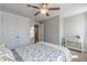 Well-lit bedroom with closet space, a doorway to another living space, and calming neutral colors at 1703 Prospect Way, Conyers, GA 30094