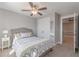 Inviting bedroom with closet space, a neutral palette, and doorway to another living space at 1703 Prospect Way, Conyers, GA 30094