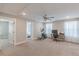 Large bonus room features neutral carpet, office space, exercise equipment, and natural light at 1703 Prospect Way, Conyers, GA 30094