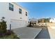 Townhome with white siding and a concrete driveway, in a quiet neighborhood at 1703 Prospect Way, Conyers, GA 30094
