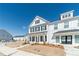 Charming two-story home with black shutters, white siding, and landscaped front yard at 1703 Prospect Way, Conyers, GA 30094
