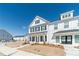 Attractive white two-story home with black shutters and manicured front lawn at 1703 Prospect Way, Conyers, GA 30094