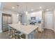 Modern kitchen features an island, stainless steel appliances, and lots of counter space at 1703 Prospect Way, Conyers, GA 30094