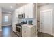 Well-equipped kitchen featuring stainless steel appliances, white cabinets, and stylish countertops at 1703 Prospect Way, Conyers, GA 30094