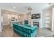 Stylish living room with hardwood floors, fireplace, and open layout to kitchen at 1703 Prospect Way, Conyers, GA 30094
