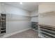 Walk-in closet with shelving, shoe racks, and hanging storage at 1703 Prospect Way, Conyers, GA 30094