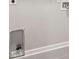 Picture of the basement with gray flooring and utility connections at 3195 Tackett Rd, Douglasville, GA 30135