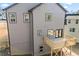 Back of house showing windows, a deck, and gray siding at 3195 Tackett Rd, Douglasville, GA 30135
