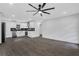 Open-concept living area with modern fixtures, hardwood floors, and an abundance of natural light at 3850 Crosby Nw Dr, Atlanta, GA 30331