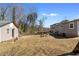 Expansive backyard featuring a shed, perfect for outdoor activities and relaxation at 147 Windy Hill Sw Rd, Marietta, GA 30060