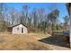 Backyard featuring shed with path, perfect for outdoor activities and relaxation at 147 Windy Hill Sw Rd, Marietta, GA 30060