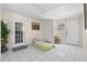 Bright bonus room with tile flooring, neutral walls, multiple doors and a window at 147 Windy Hill Sw Rd, Marietta, GA 30060