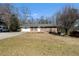 Charming brick home featuring a well-maintained front yard and a welcoming entrance at 147 Windy Hill Sw Rd, Marietta, GA 30060