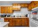 Cozy kitchen featuring wooden cabinets, ample counter space, and modern appliances for all your cooking needs at 147 Windy Hill Sw Rd, Marietta, GA 30060