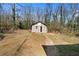 Backyard featuring shed with path, perfect for outdoor storage at 147 Windy Hill Sw Rd, Marietta, GA 30060