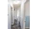 Hallway featuring fresh paint, new floors, and multiple doorways leading to various rooms at 3894 Summit Dr, Douglasville, GA 30135