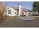 Backyard view of home with a patio and outdoor seating, with ample space for relaxing at 4198 Haynes Mill Nw Ct, Kennesaw, GA 30144