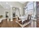 Elegant dining room with lots of light, hardwood floors, and views to the entry at 4198 Haynes Mill Nw Ct, Kennesaw, GA 30144