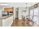 Bright dining area with stainless steel appliances and seating for four at 4198 Haynes Mill Nw Ct, Kennesaw, GA 30144