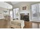 Dining room features a fireplace, ample light, and seating for four at 4198 Haynes Mill Nw Ct, Kennesaw, GA 30144