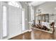 Formal dining room featuring hardwood floors, a chandelier, and an abundance of natural light at 4198 Haynes Mill Nw Ct, Kennesaw, GA 30144