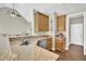 Spacious kitchen with granite countertops, stainless steel appliances, and wood cabinets at 4198 Haynes Mill Nw Ct, Kennesaw, GA 30144